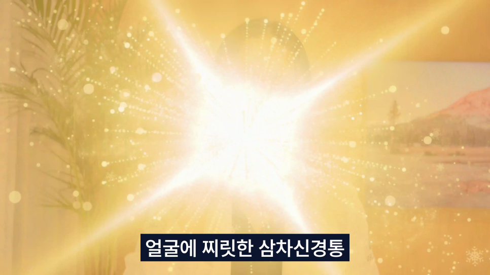 중앙에서 밝은 황금색 빛이 강하게 퍼져나가며 작은 빛 알갱이들이 흩뿌려진 추상적인 이미지